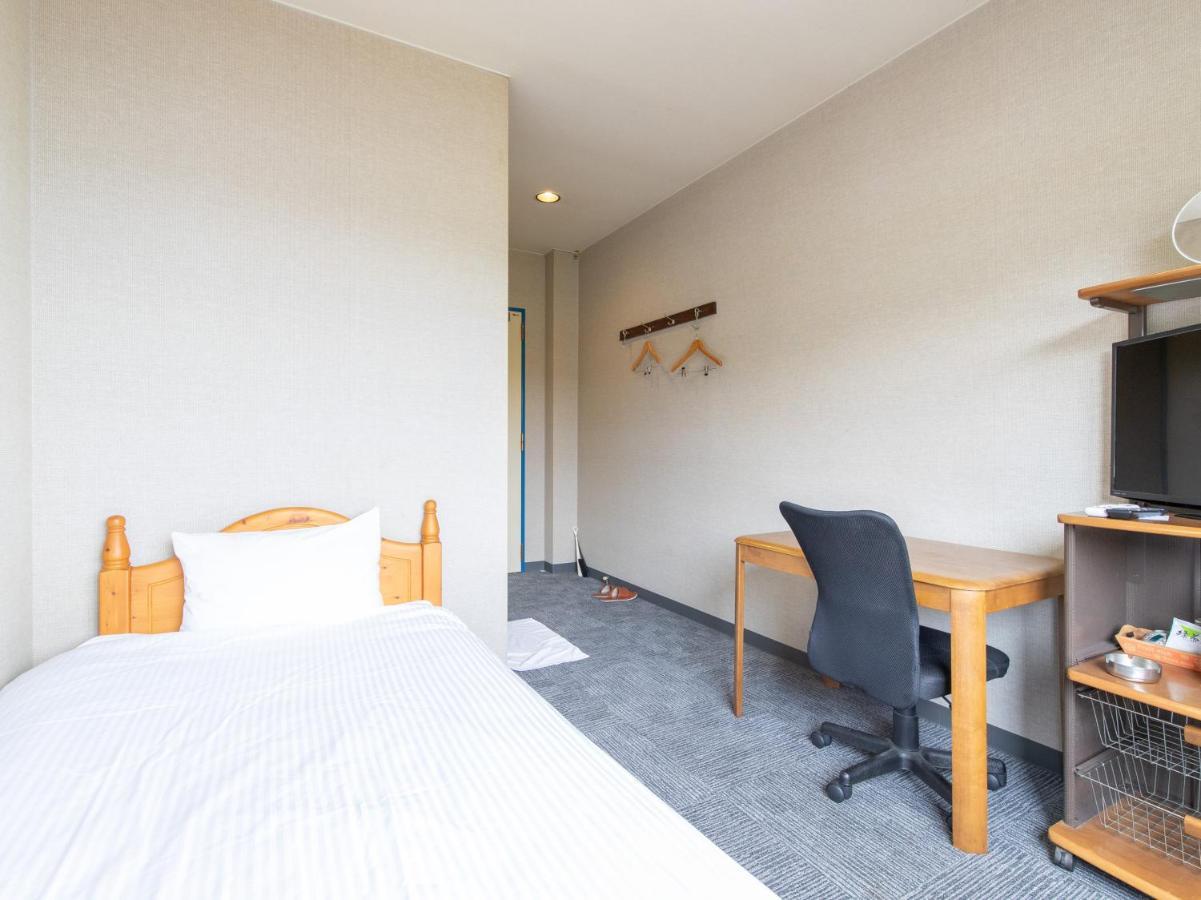 Tabist Izumi Yusen Shukuhaku Center Hotel Buitenkant foto