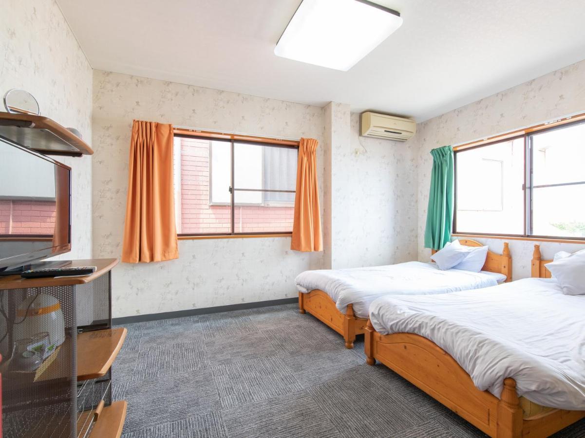 Tabist Izumi Yusen Shukuhaku Center Hotel Buitenkant foto